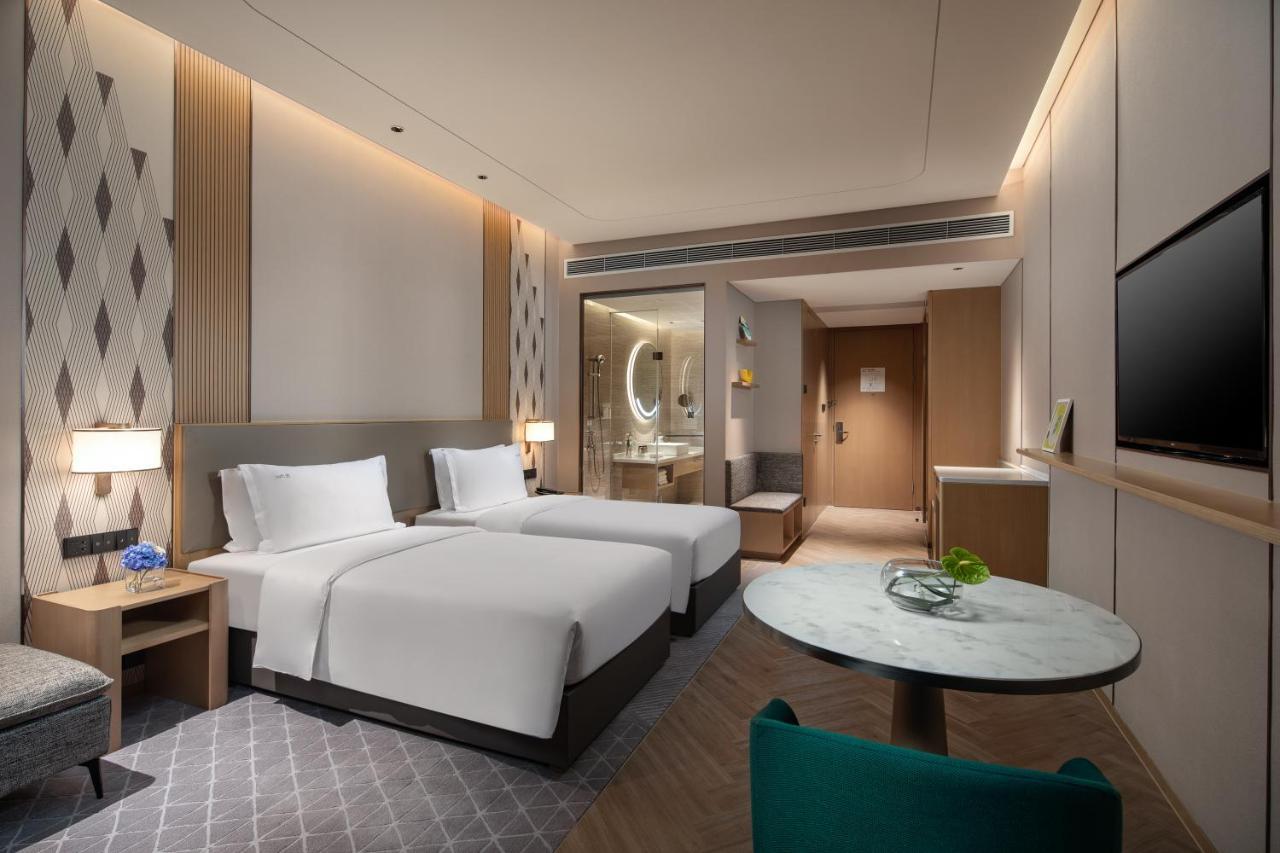 Holiday Inn Wuxi Central Station By Ihg Exterior foto