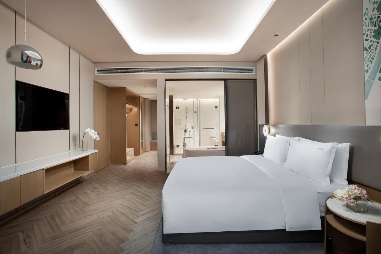 Holiday Inn Wuxi Central Station By Ihg Exterior foto